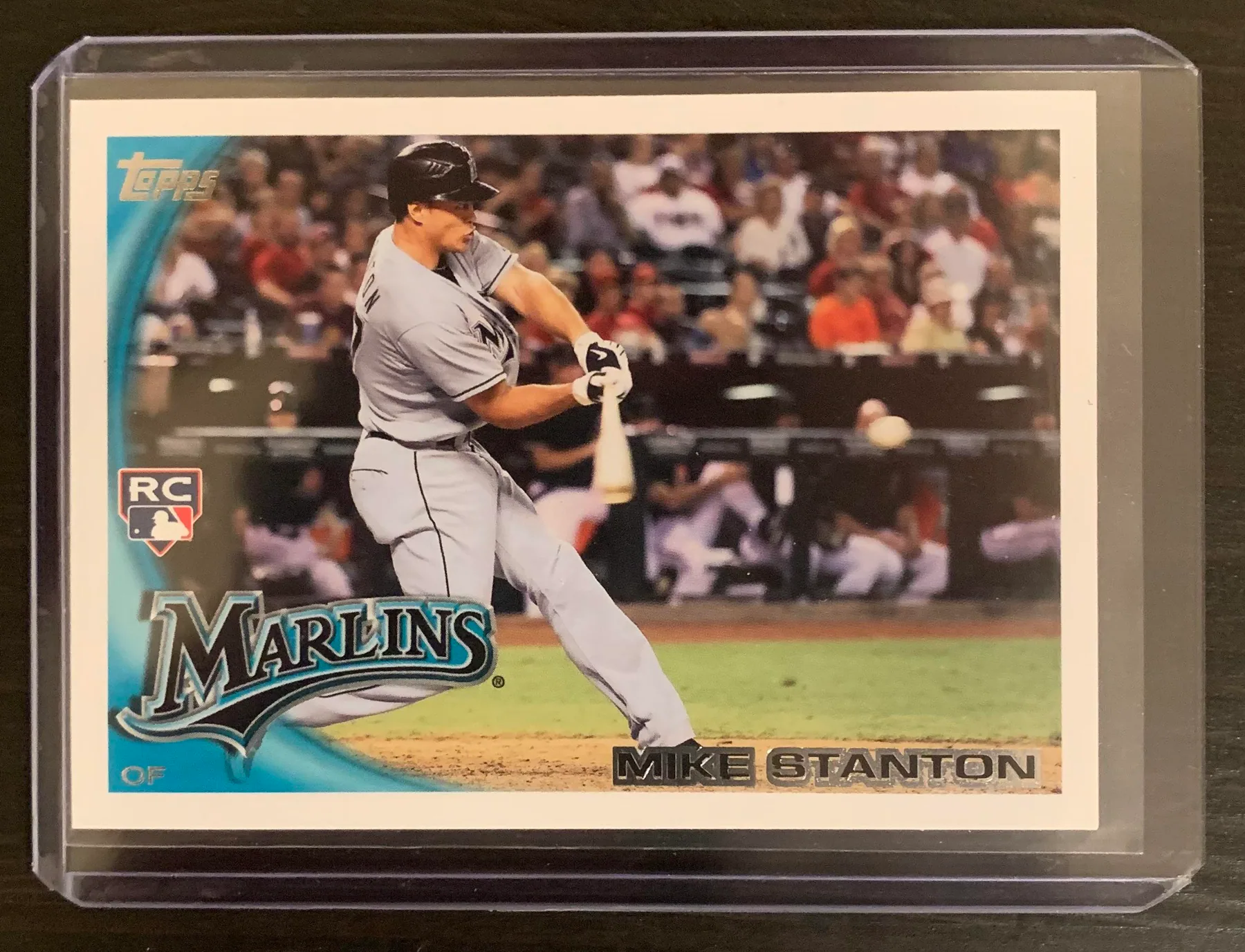 Horizontal sports card used to demonstrate standard left-to-right and top-to-bottom centering.